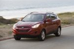 Picture of 2012 Hyundai Tucson AWD in Garnet Red