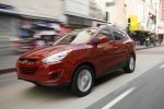 Picture of 2013 Hyundai Tucson AWD in Garnet Red
