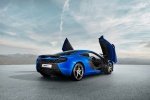 Picture of 2015 McLaren 650S Coupe with doors open in Aurora Blue