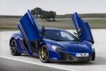 Picture of 2015 McLaren 650S Coupe with doors open in Aurora Blue